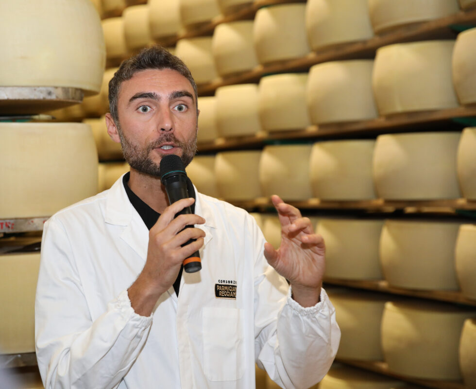 A representative of the Parmigiano Reggiano PDO Consortium explaining how the cheese is made at the Caseificio Agricolo del Milanello.
